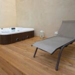 jacuzzi-deck-chair-wooden-floor_268835-3793